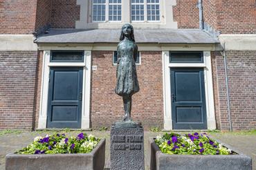 Statue of Anne Frank pictured in Amsterdam (the Netherlands) serving as a permanent reminder to the Jews who were murdered by the Nazis during World War Two, pictured on 27 May 2024. The statue was created in 1977 by then-mayor Ivo Samkalden and Anness father Otto.